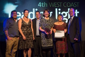 Trust Chair, Kerry-Jayne Wilson and Manager, Inger Perkins, with the Westland Milk products team and the Not for Profit trophy